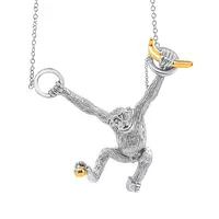 silver monkey necklace with gold banana for women