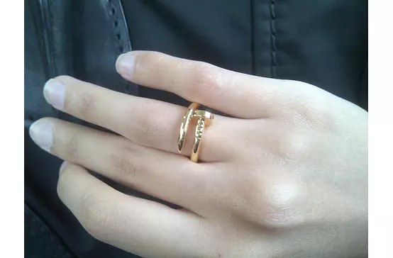 women wearing cartier gold ring