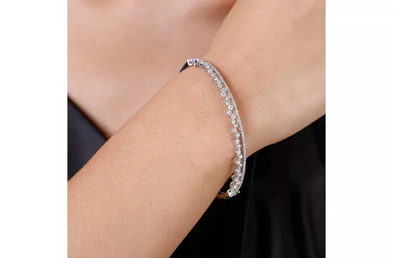 yellow gold diamond bracelet on hand model