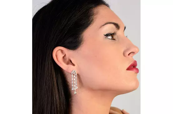 diamond drop earrings for rent on model