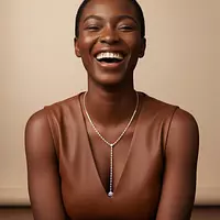 Diamond lariat necklace with an oval drop for rent