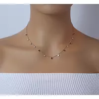 Garnet and diamonds necklace on model
