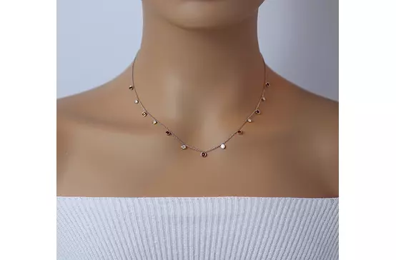 Garnet and diamonds necklace on model