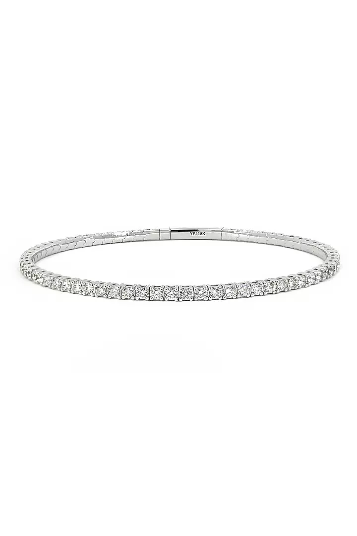 Rent flexible diamond tennis bangle with emerald cut diamonds