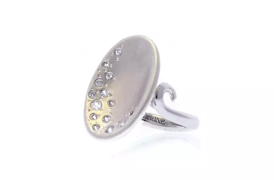 Designer cocktail ring with white sapphires for rent