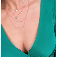 women wearing sterling silver diamond necklace