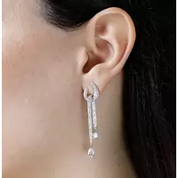 Wedding day bridal earrings rentals in diamonds on a model