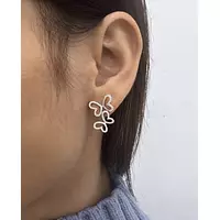 diamond butterfly earrings for rent on a model