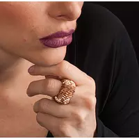 women wearing rose gold sapphire ring