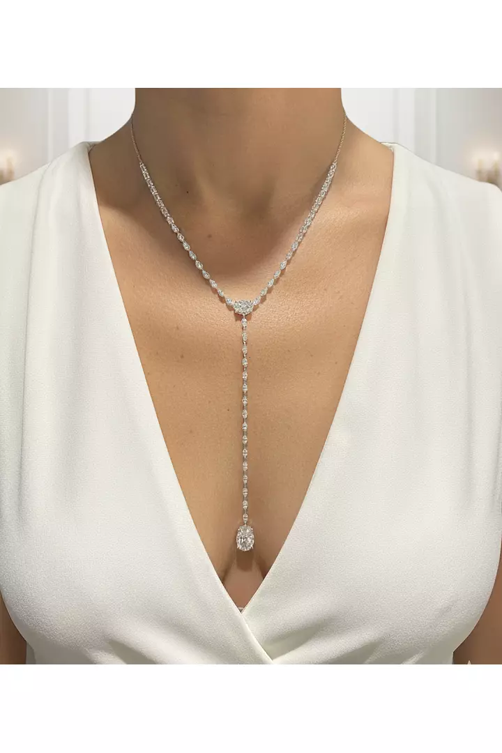 Rent diamond lariat necklace with an oval diamond drop