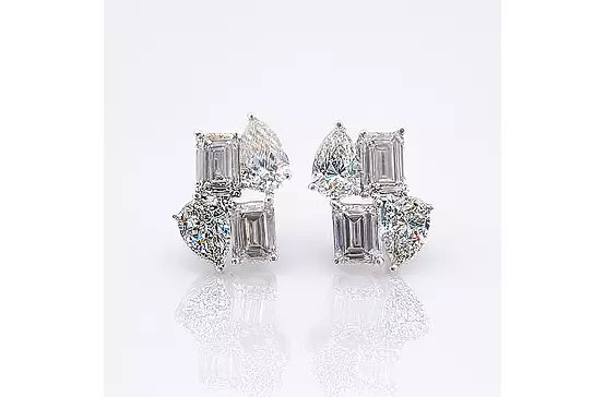 Rent diamond cluster earrings with pear and emerald shaped diamonds