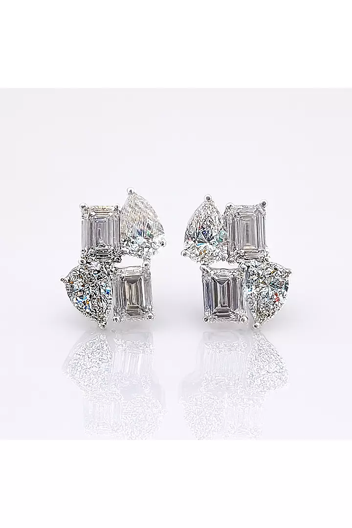 Rent diamond cluster earrings with pear and emerald shaped diamonds