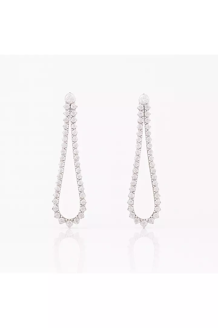 Rent teardrop shaped diamond tennis style drop earrings for a wedding
