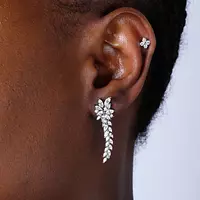 diamond cluster drop earrings for rent on a black model ear