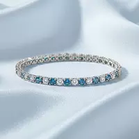 blue and white diamond tennis bracelet in white gold for rent for a wedding or special event borrow