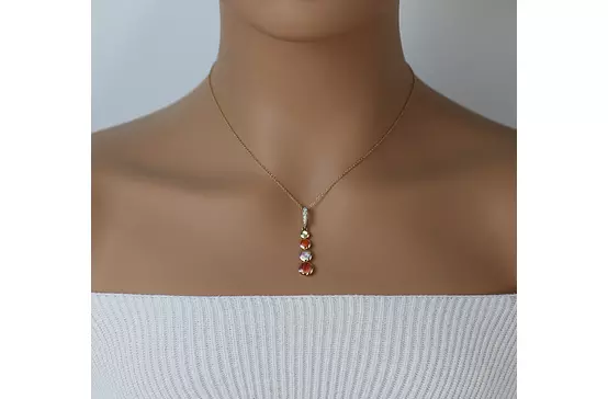 rent designer Kabana necklace in yellow gold and red coral