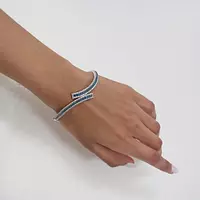 BLUE DIAMONDS BYPASS BRACELET FOR RENT ON HAND MODEL