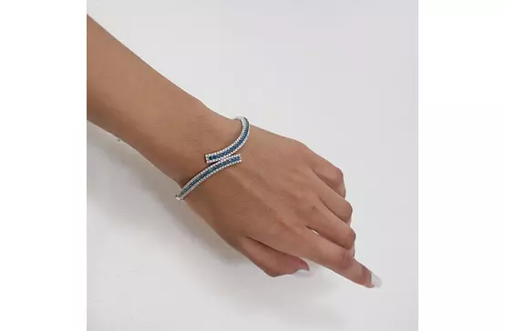 BLUE DIAMONDS BYPASS BRACELET FOR RENT ON HAND MODEL