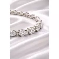 pear shaped east west diamonds tennis bracelet for rent