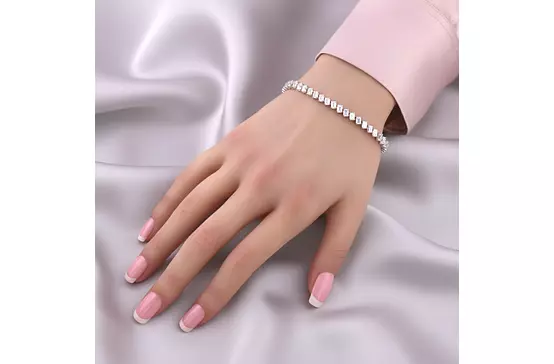 Rent diamond tennis bracelet sideways baguettes and emerald cuts in white gold