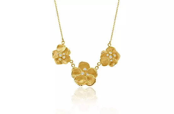 Rent designer diamond necklace with yellow gold flowers