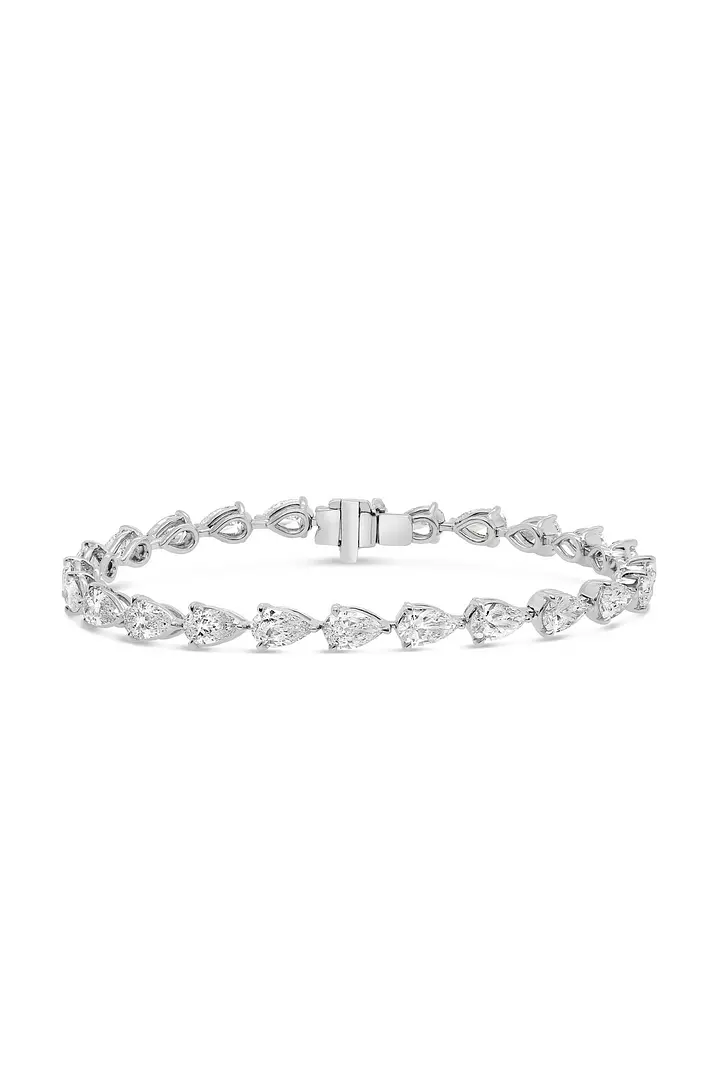 Rent diamond tennis bracelet with east west pear shaped diamonds
