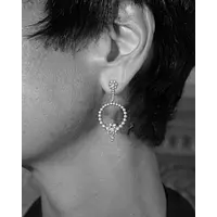 women wearing sterling silver diamond drop earrings