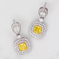 fancy yellow and white diamonds cushion shaped drop earrings for bridal rental or wedding day