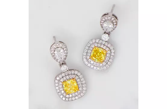 fancy yellow and white diamonds cushion shaped drop earrings for bridal rental or wedding day