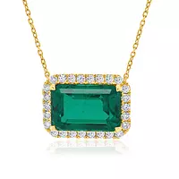 emerald and diamonds necklace for rent in a closeup