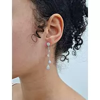 Cascade diamond earrings on a model