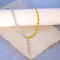 Diamond lariat necklace for rent with white and yellow diamonds