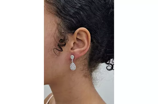 diamond drop earrings on model