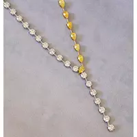 Rent diamond tennis necklace with yellow diamonds and lariat shape 