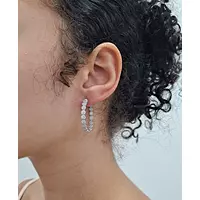 diamond hoop earrings on model to borrow