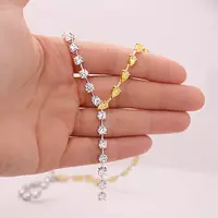 white and yellow diamonds pear shaped lariat tennis necklace for rent
