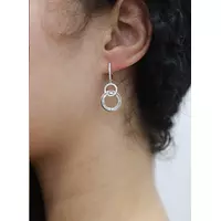diamond circle drop earrings on model