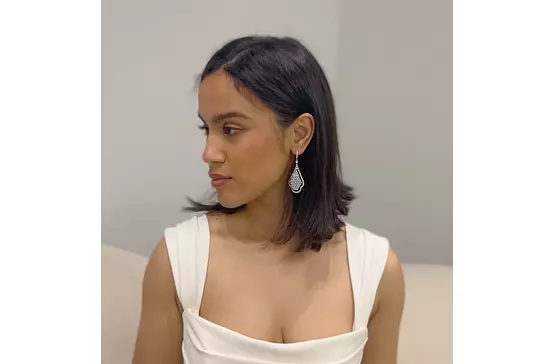 teardrop pear shaped drop earrings for rent on a model