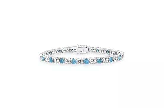 blue and white diamond tennis bracelet in white gold for rent for a wedding or special event