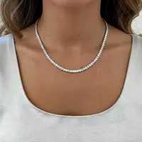 emerald shaped diamond tennis necklace on a model