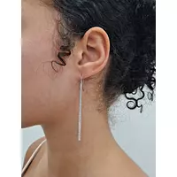 Diamond Stick earrings on a model