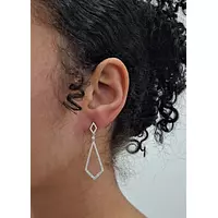 Open Space diamond drop earrings on model