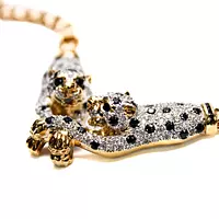 closeup of diamonds and sapphire necklace