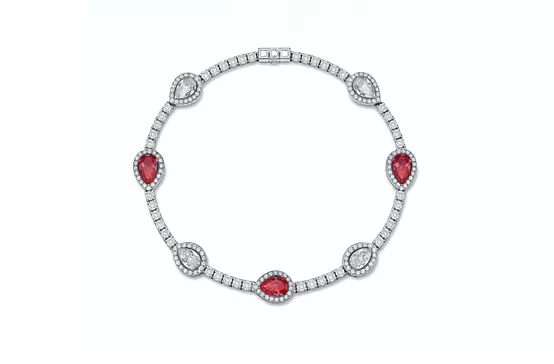 rent pink diamonds tennis bracelet with pear shaped halo stations