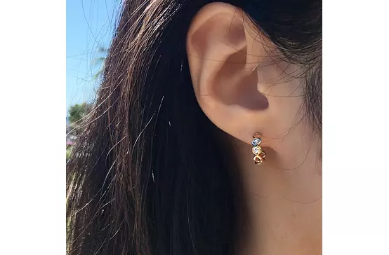 diamond hoop earrings on a model