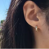 diamond hoop earrings on a model