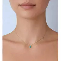 Emerald and diamonds pendant necklace on a model for rent