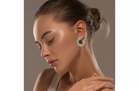 diamond earrings for rent on model