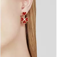 red alhambra drop earrings for rent on model