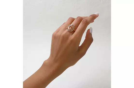 pear shaped morganite ring on hand for rent